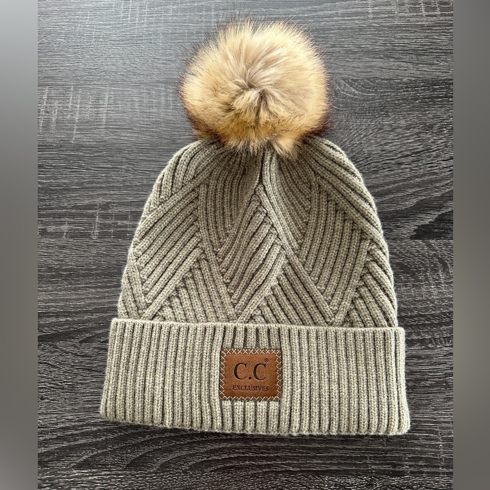knit beanie with fur pom